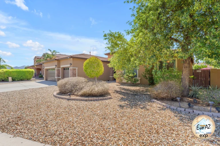Front yard and curb appeal of a home in the Sierra Montana community in Surprise AZ