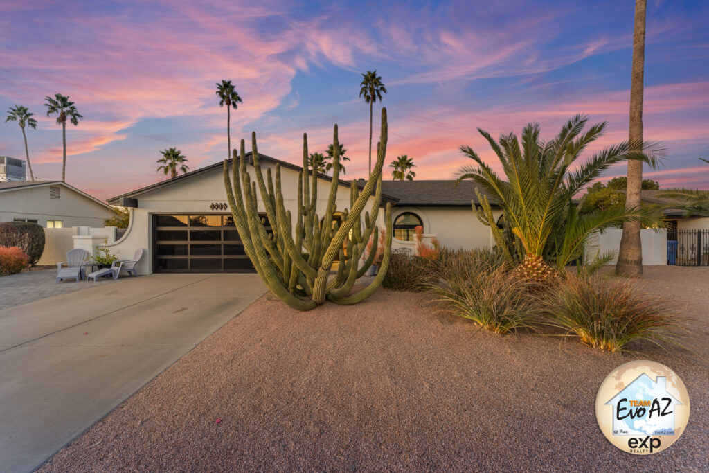 Front exterior of a single family home in Scottsdale Arizona with desert landscaping