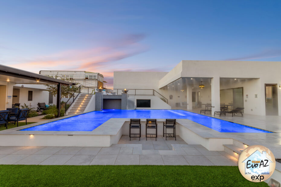Resort backyard pool of Surprise home just sold with swim up bar and grotto