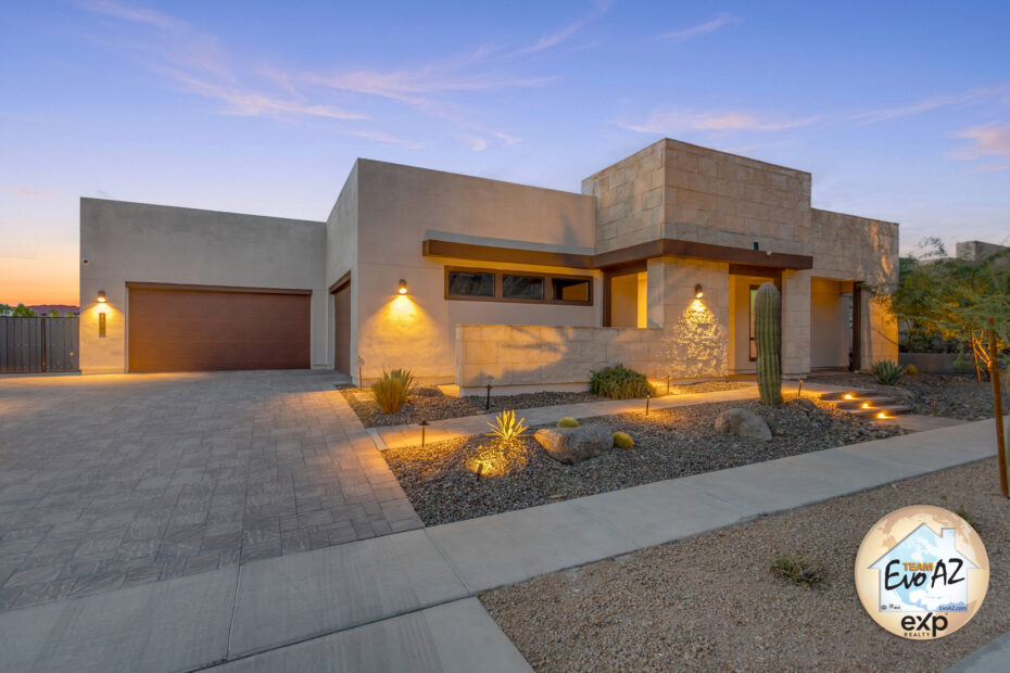 luxury home with mountain views in Phoenix front exterior on corner lot with desert landscaping