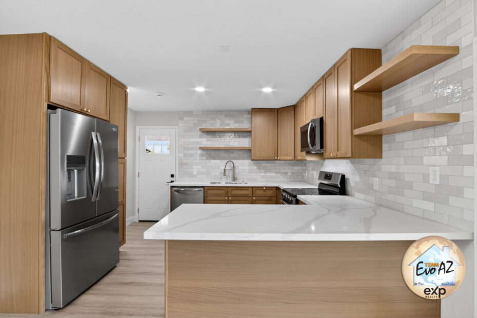 Mesa AZ remodeled 5 bedroom home front exterior at 314 E Glade Ave with updated curb appeal. Discover this Mesa AZ 5 bedroom home featuring updated finishes, a modern kitchen, RV gate and a convenient location near Downtown Mesa.